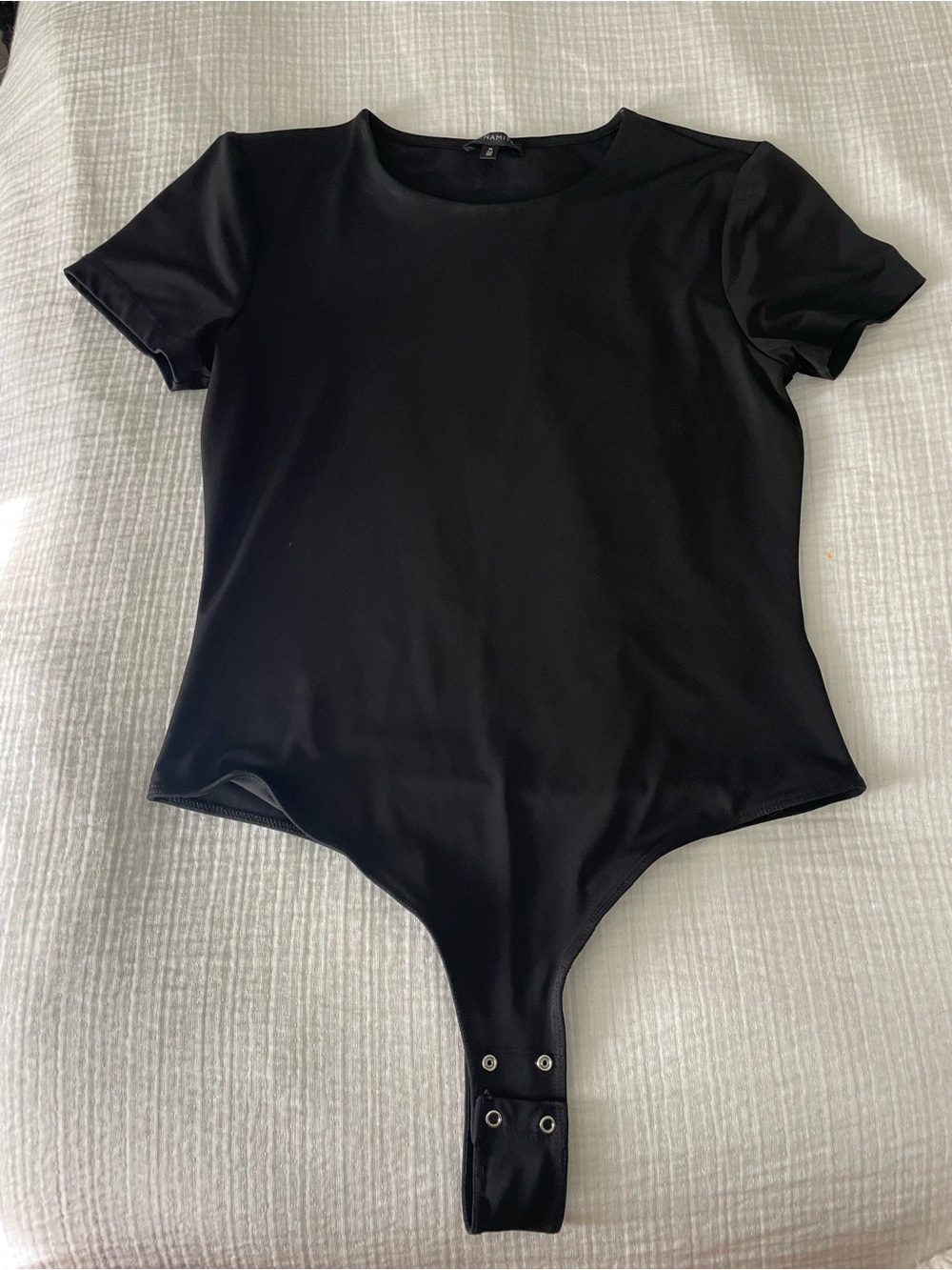 DYNAMITE Black Short Sleeve One-Piece Bodysuit